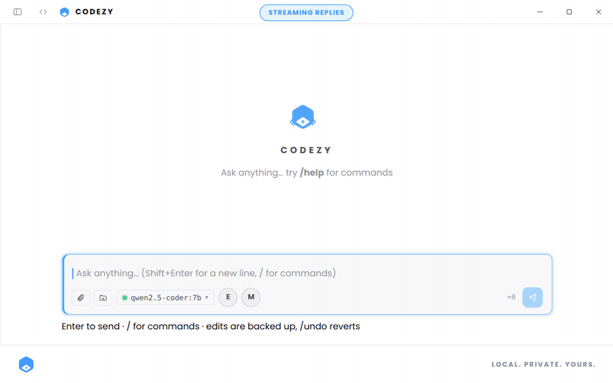 CODEZY empty state with a reply streaming token by token into the chat.